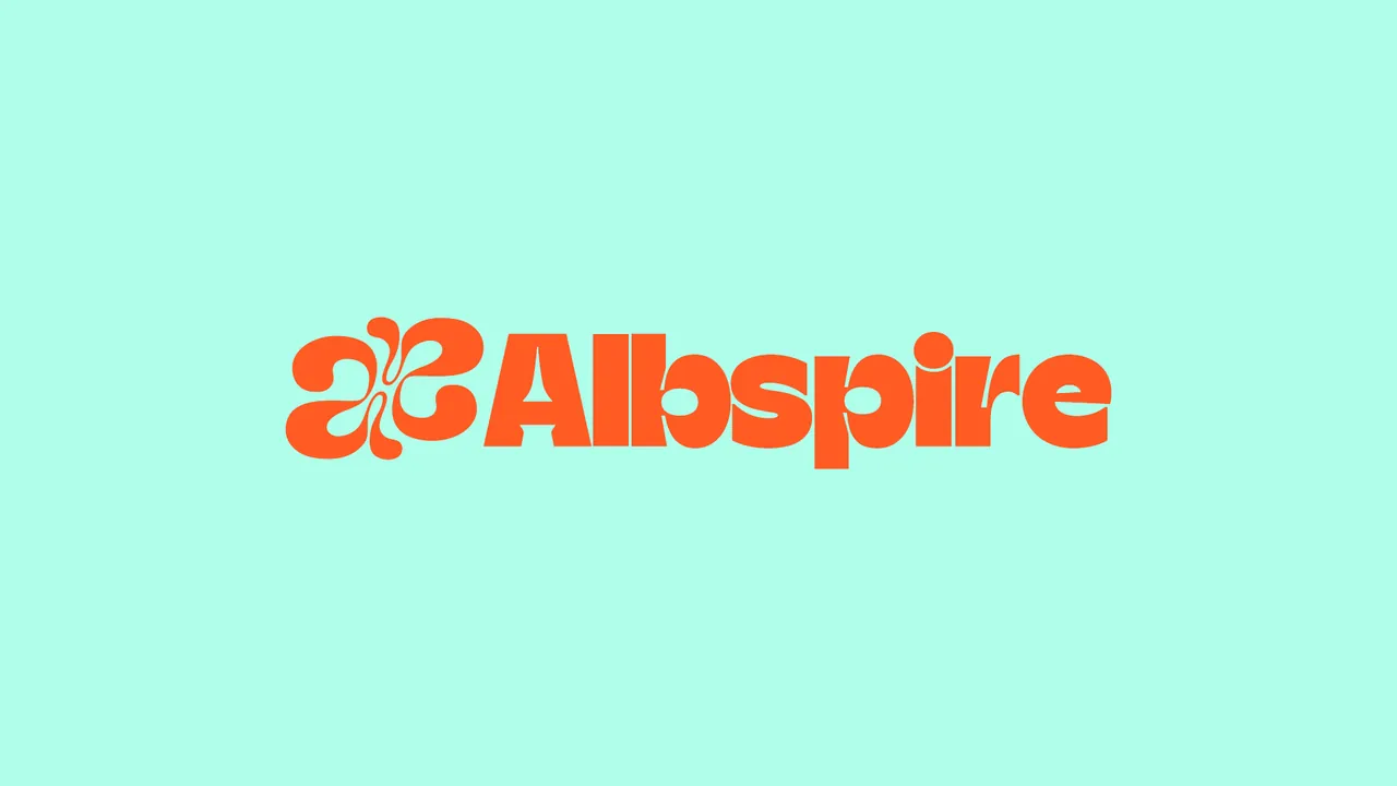 Albspire orange logo on a mint background