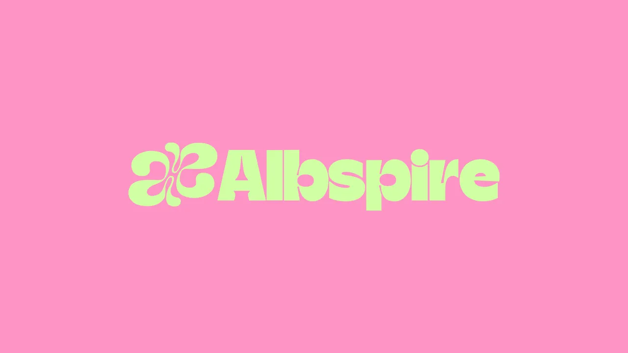 Albspire pale green logo on a pink background