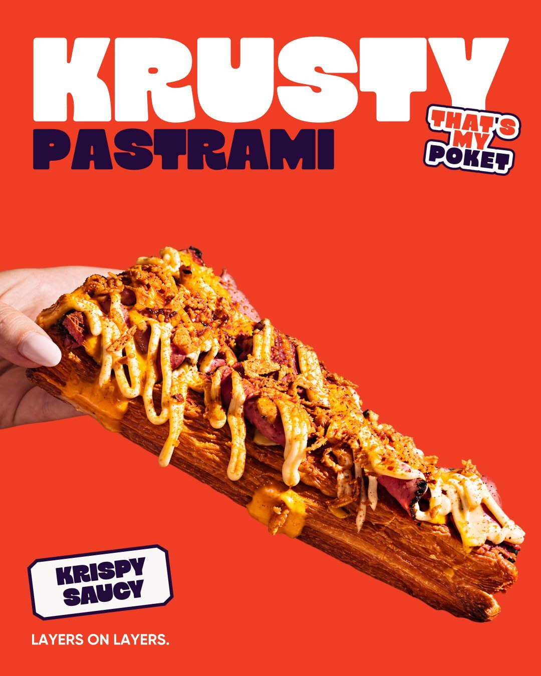 Krusty Pastrami sandwich with bold lettering on red-orange.