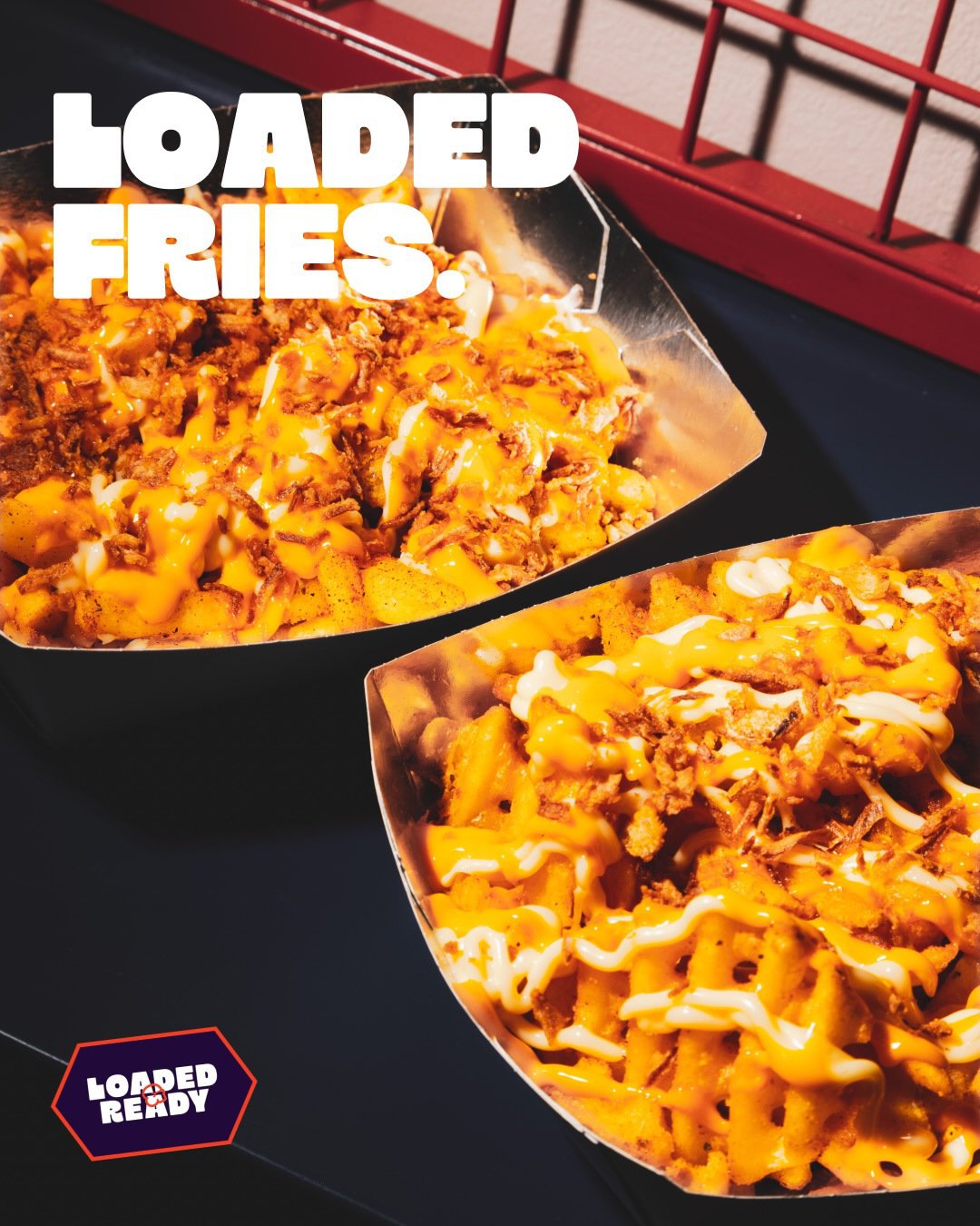Loaded Fries campaign showing two trays of topped fries.