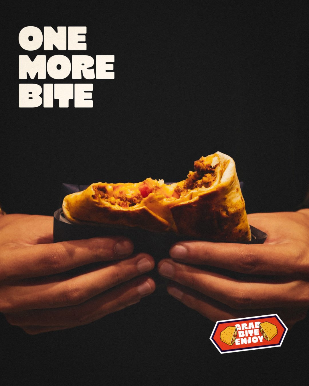 One More Bite campaign with hands holding a filled wrap.