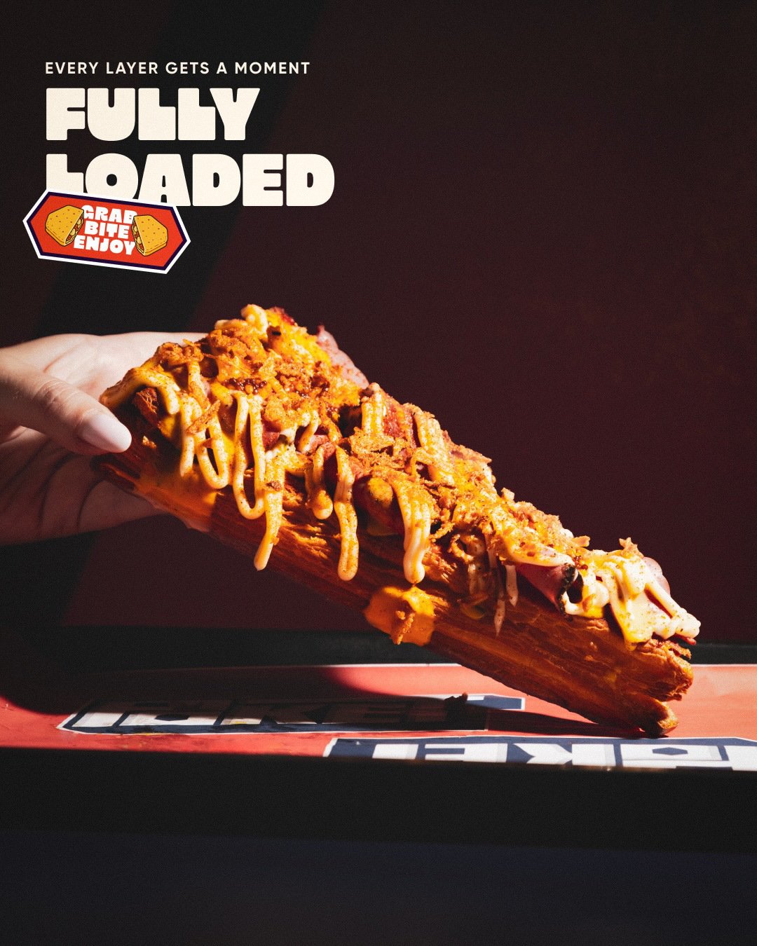 Fully Loaded campaign featuring a topped pastrami sandwich.